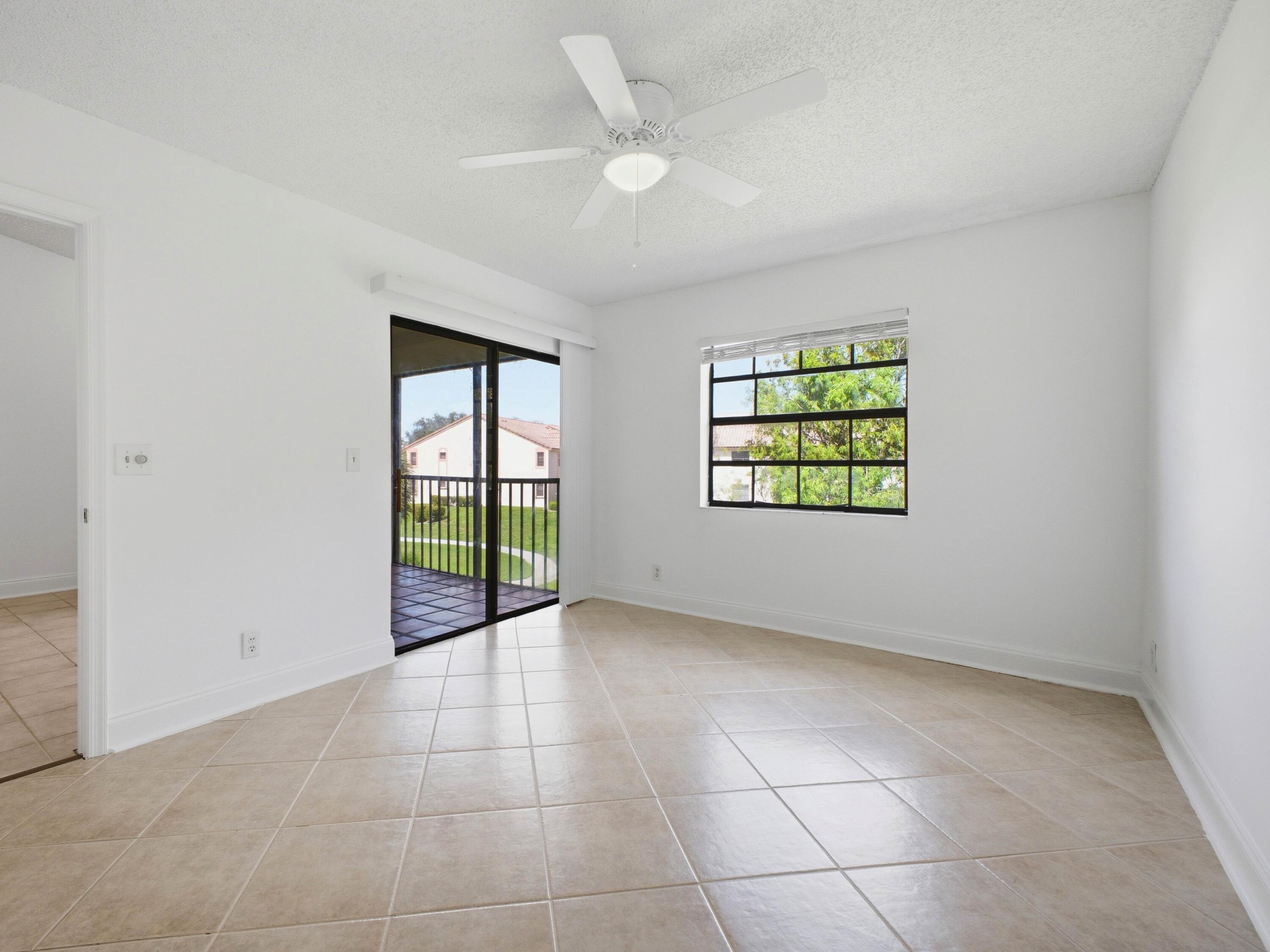 321 Norwood Terrace, Unit N221 Boca Raton, FL 33431 - Photo 24 of 36 Primary Bedroom