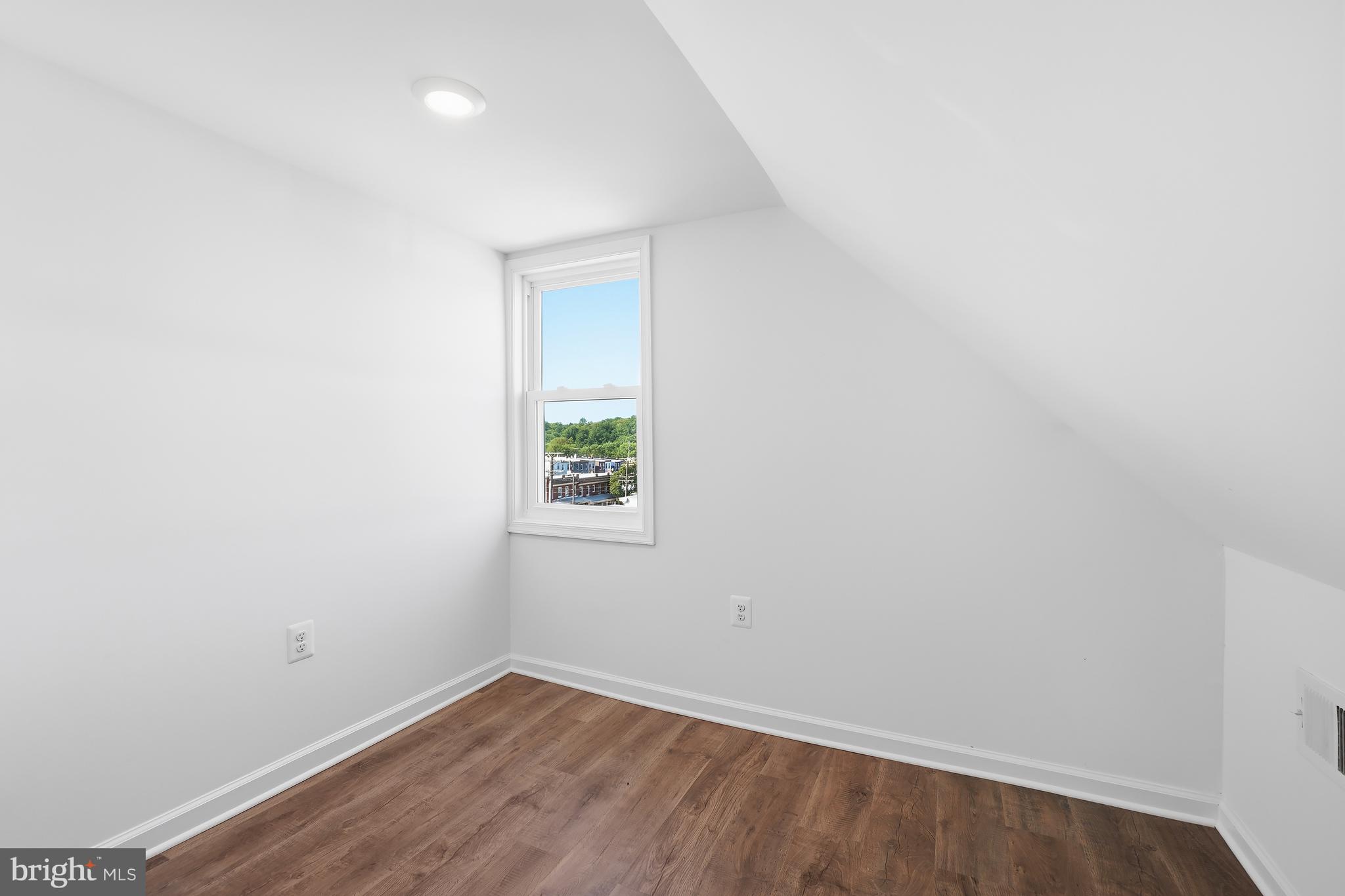 3731 Falls Road Baltimore, MD 21211 - Photo 27 of 30 an empty room with a window