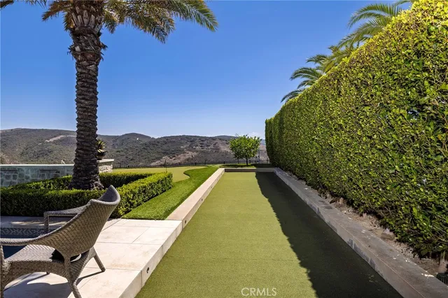 a view of swimming pool with a garden
