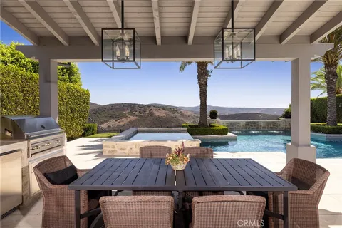 a view of an outdoor sitting area with couch