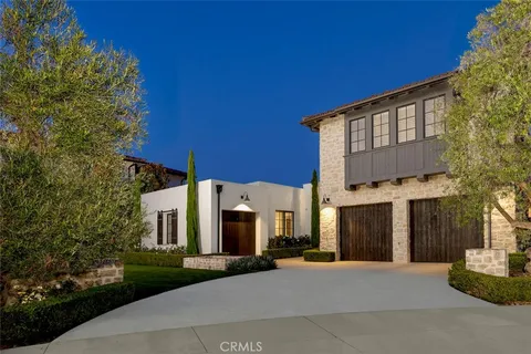 a view of a building with a yard