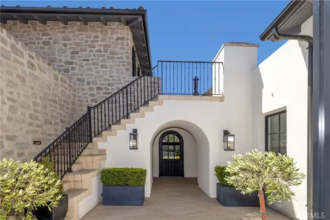 a view of entryway with flower pots