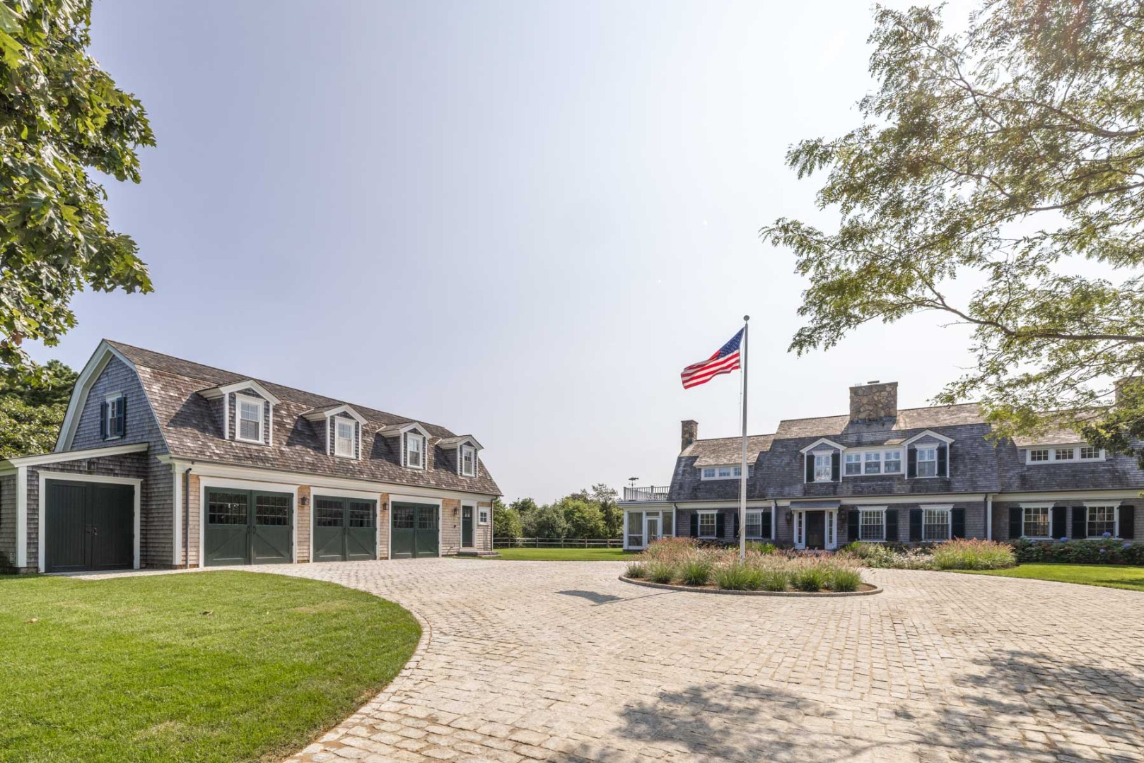 24 Katama Bay View Road Edgartown, MA 02539 - Photo 11 of 26 a front view of a house with a yard
