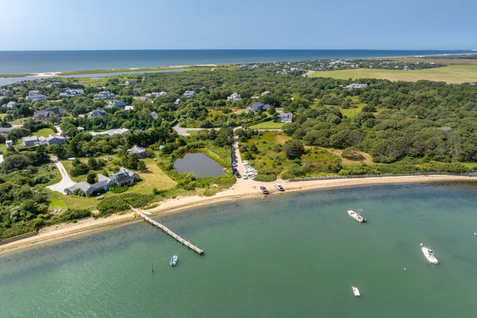 24 Katama Bay View Road Edgartown, MA 02539 - Photo 2 of 26 a view of an outdoor space and a lake view