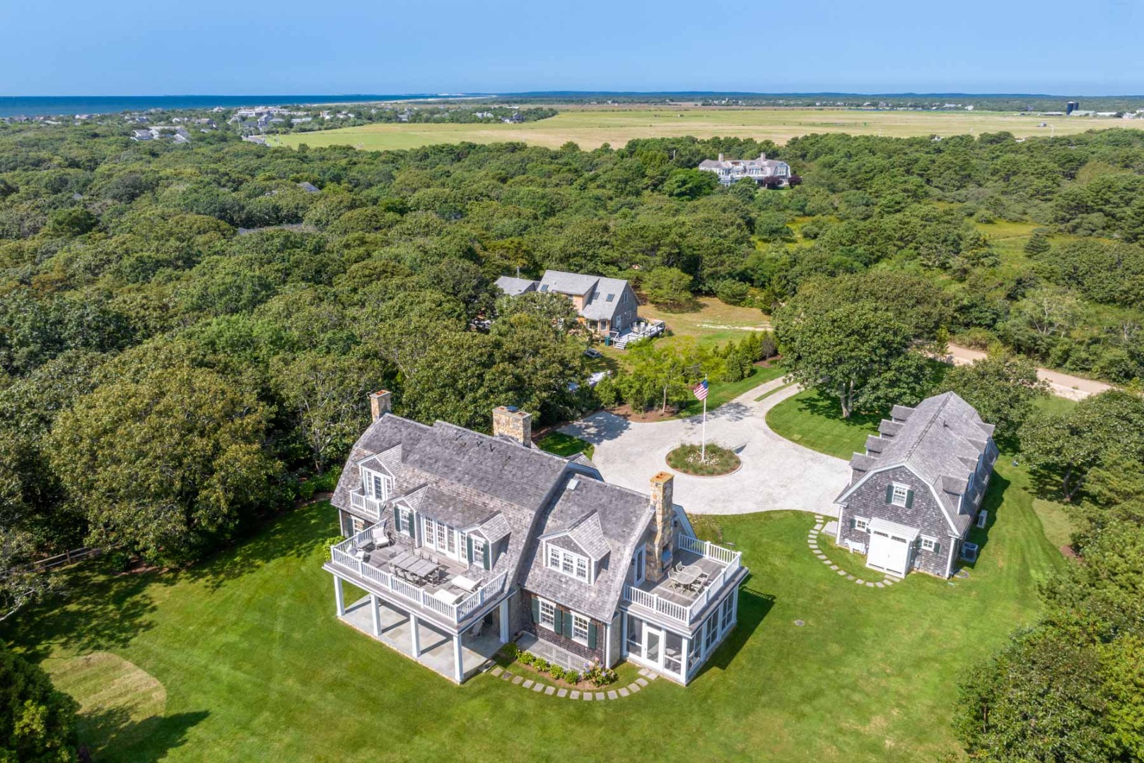 24 Katama Bay View Road Edgartown, MA 02539 - Photo 8 of 26 an aerial view of a house with garden