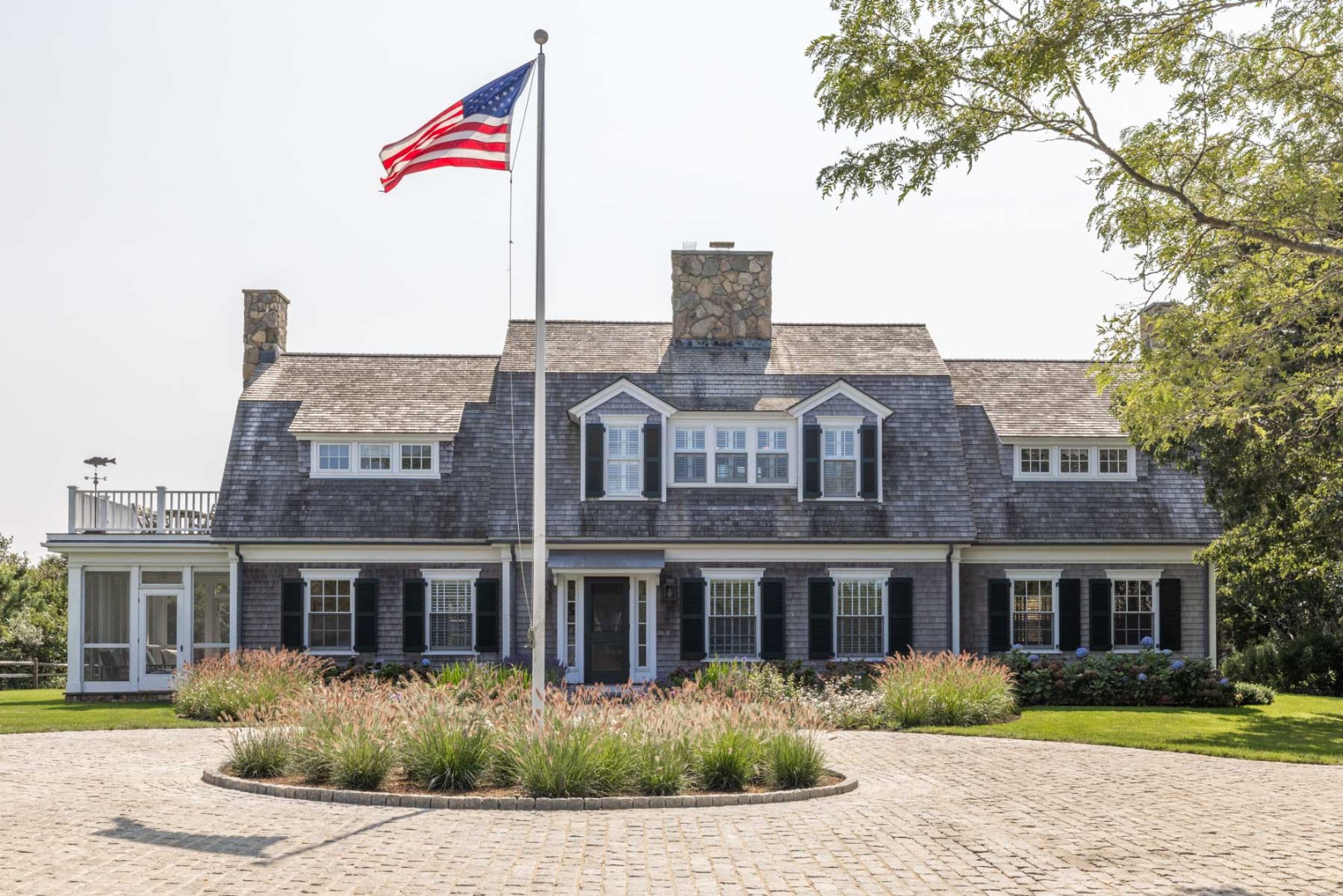 24 Katama Bay View Road Edgartown, MA 02539 - Photo 10 of 26 a front view of a house with garden