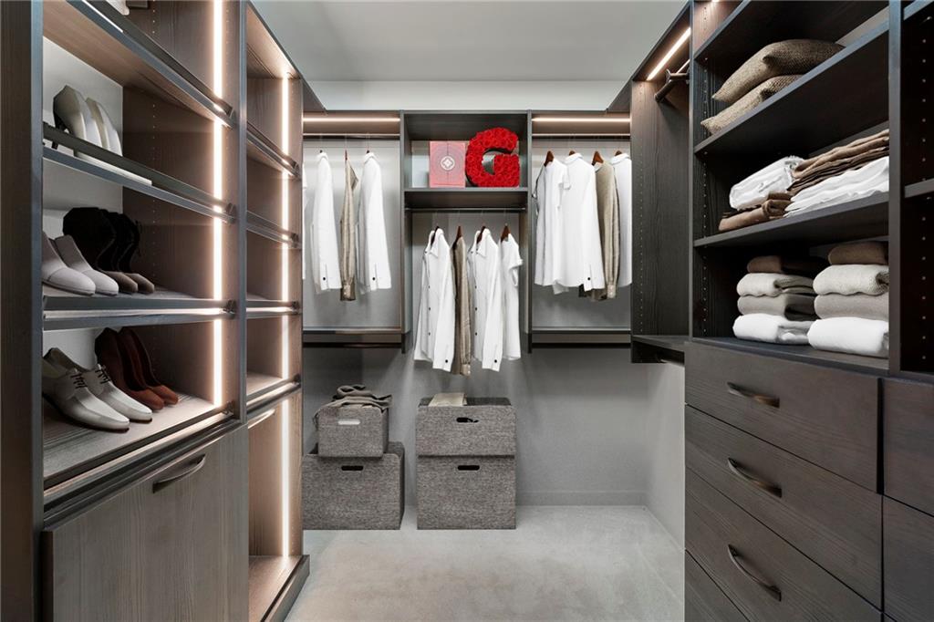 260 18th Street Northwest, Unit 10224 Atlanta, GA 30363 - Photo 20 of 47 a kitchen with refrigerator and cabinets