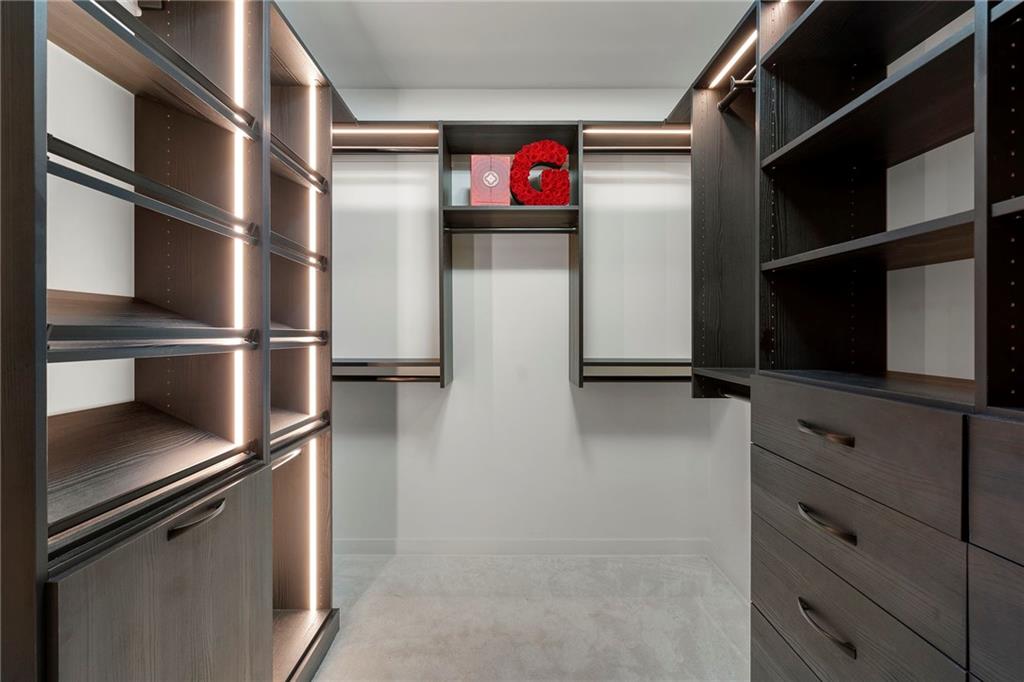 260 18th Street Northwest, Unit 10224 Atlanta, GA 30363 - Photo 21 of 47 a view of walk in closet