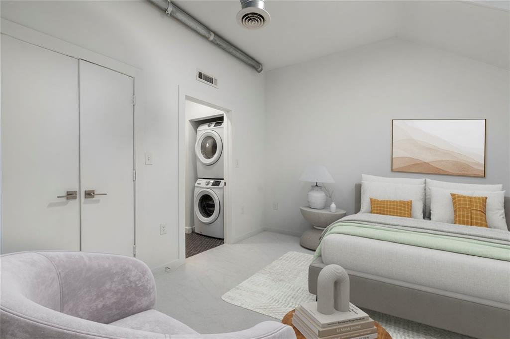 260 18th Street Northwest, Unit 10224 Atlanta, GA 30363 - Photo 22 of 47 a living room with furniture and a gate