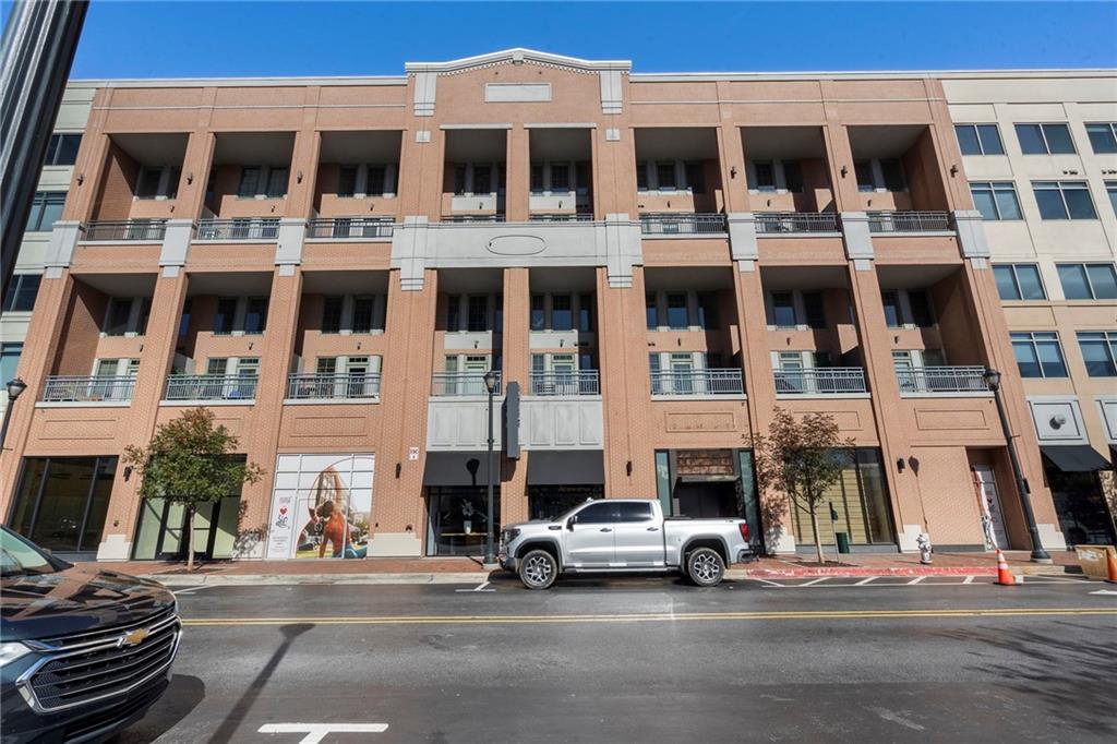 260 18th Street Northwest, Unit 10224 Atlanta, GA 30363 - Photo 28 of 47 a view of a street with a building