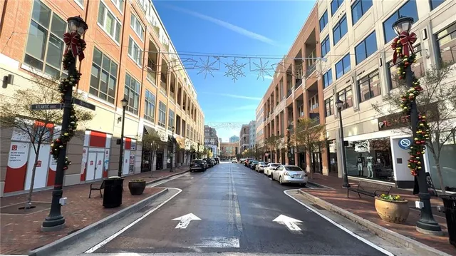 a view of street with sitting area