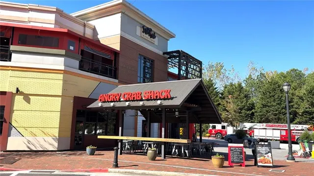 a street sign on a brick wall