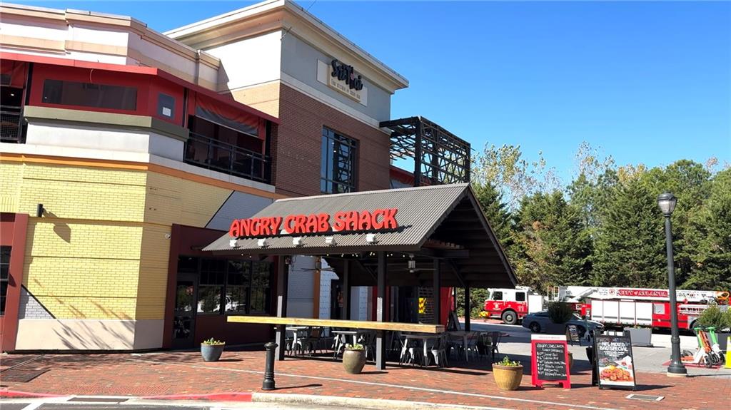 260 18th Street Northwest, Unit 10224 Atlanta, GA 30363 - Photo 41 of 47 a view of street with sitting area