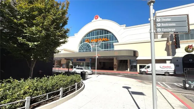a view of a car park in front of house