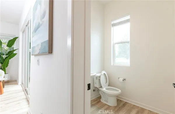 a bathroom with a toilet and a sink