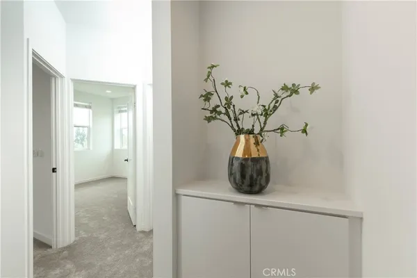 a vase of flowers sitting on a table