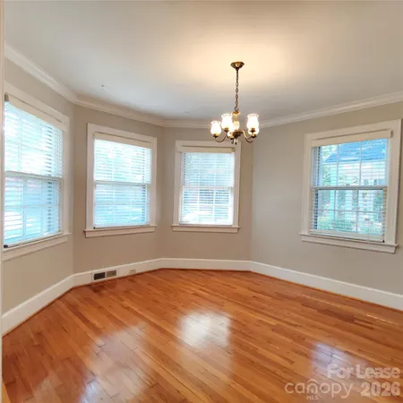 a view of a room with windows