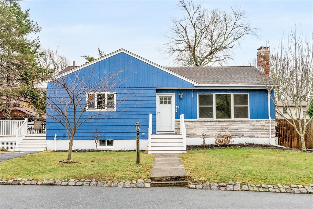 60 Goshen Road Dedham, MA 02026 - Photo 1 of 37 a front view of a house with garden