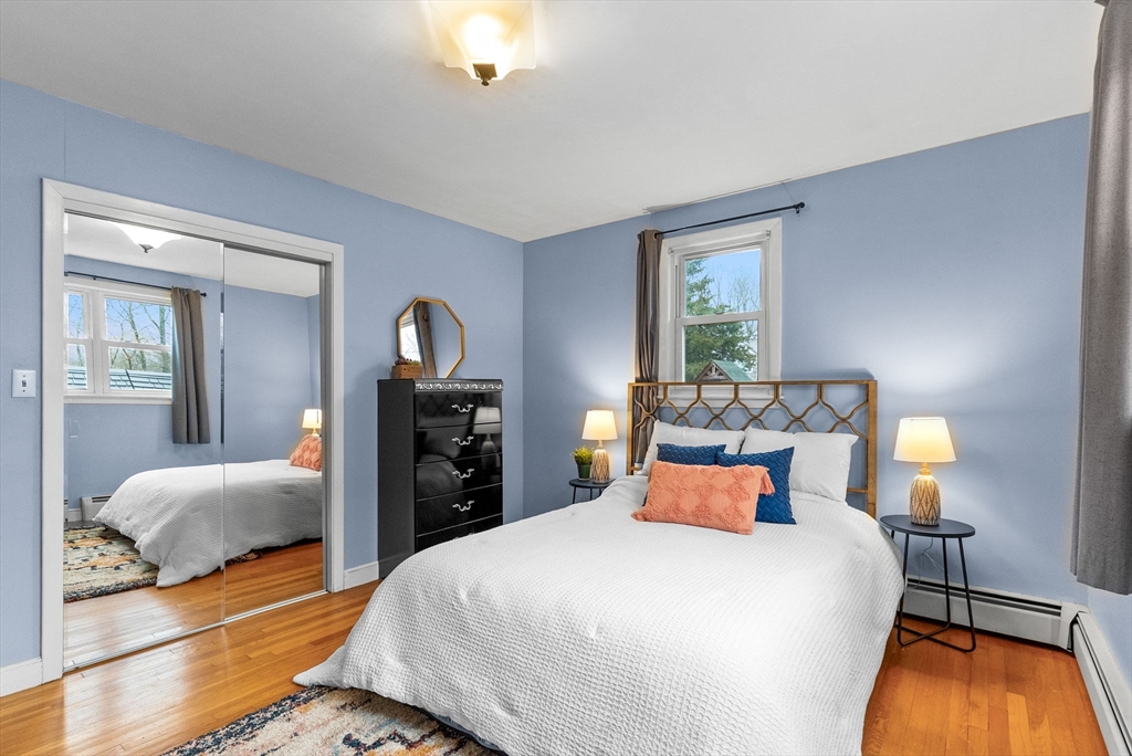 60 Goshen Road Dedham, MA 02026 - Photo 13 of 37 a bedroom with bed and window