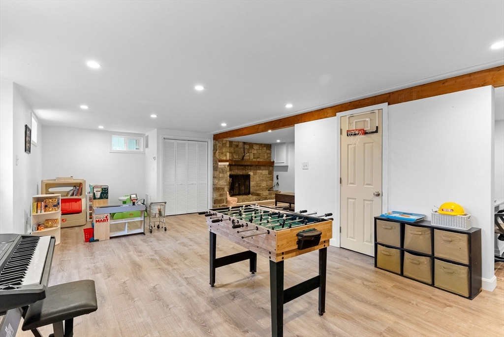60 Goshen Road Dedham, MA 02026 - Photo 26 of 37 a living room with furniture and wooden floor