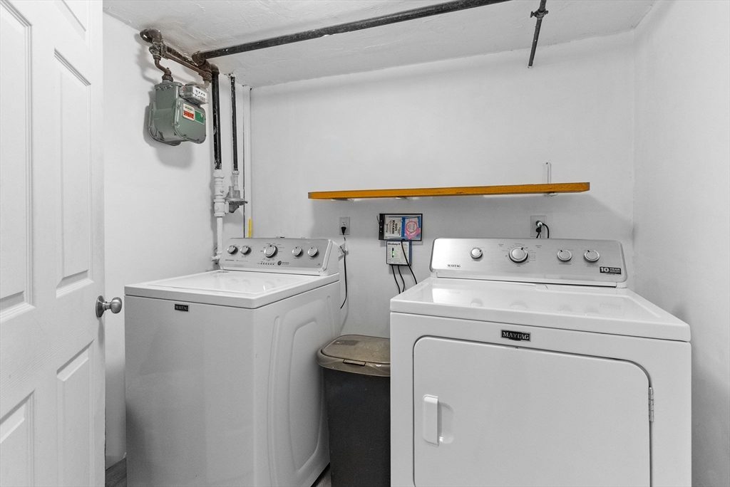 60 Goshen Road Dedham, MA 02026 - Photo 30 of 37 a utility room with dryer and washer