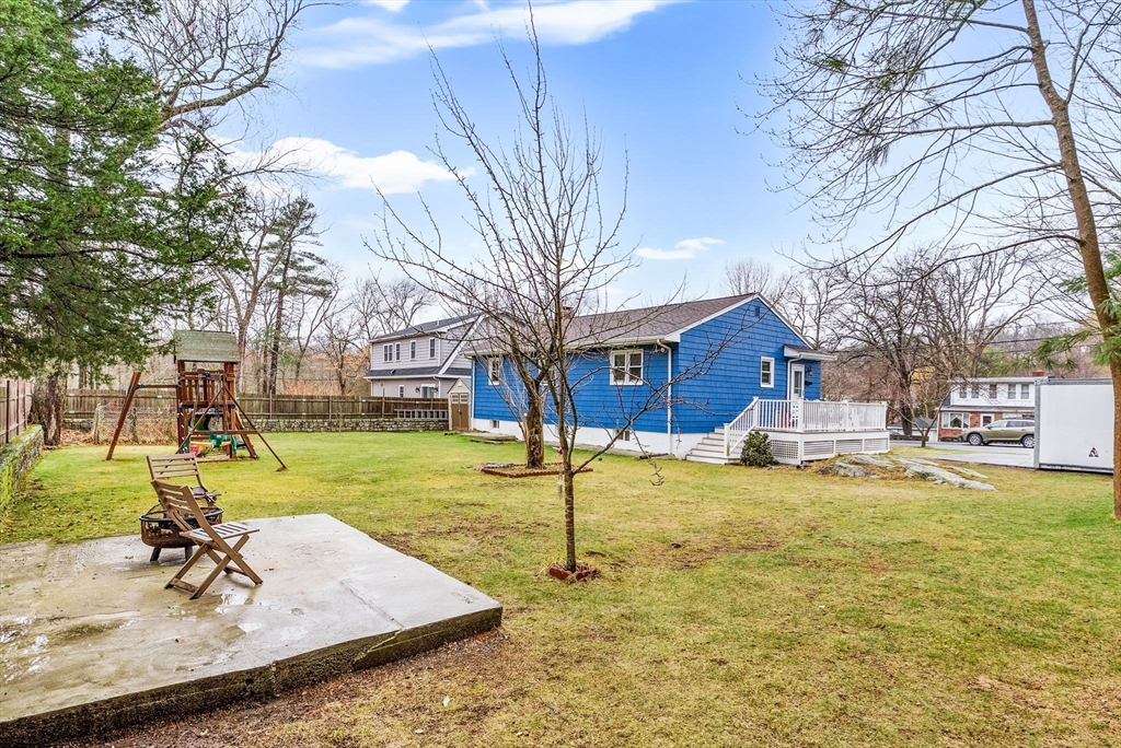 60 Goshen Road Dedham, MA 02026 - Photo 32 of 37 a view of a house with a yard