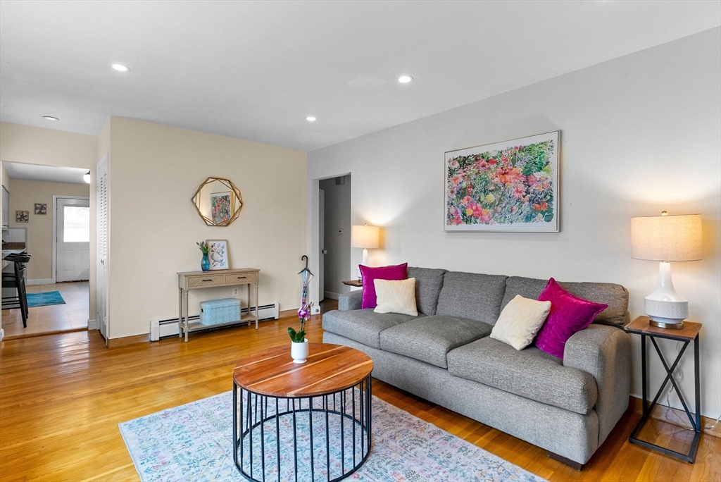 60 Goshen Road Dedham, MA 02026 - Photo 4 of 37 a living room with furniture and wooden floor