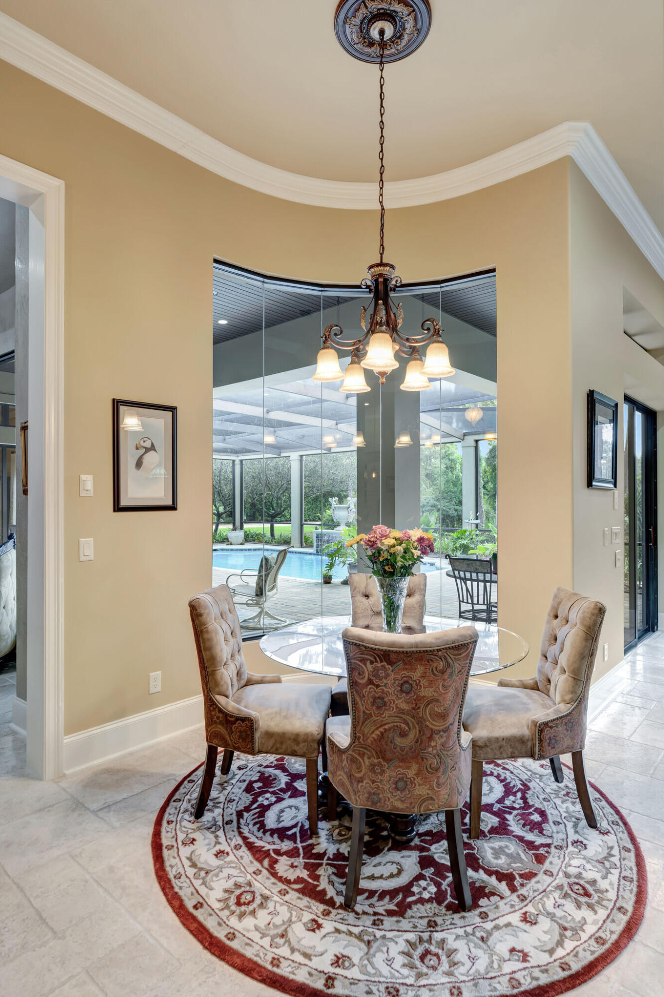 428 Captains Circle Destin, FL 32541 - Photo 13 of 88 a dining room with furniture a rug and a chandelier