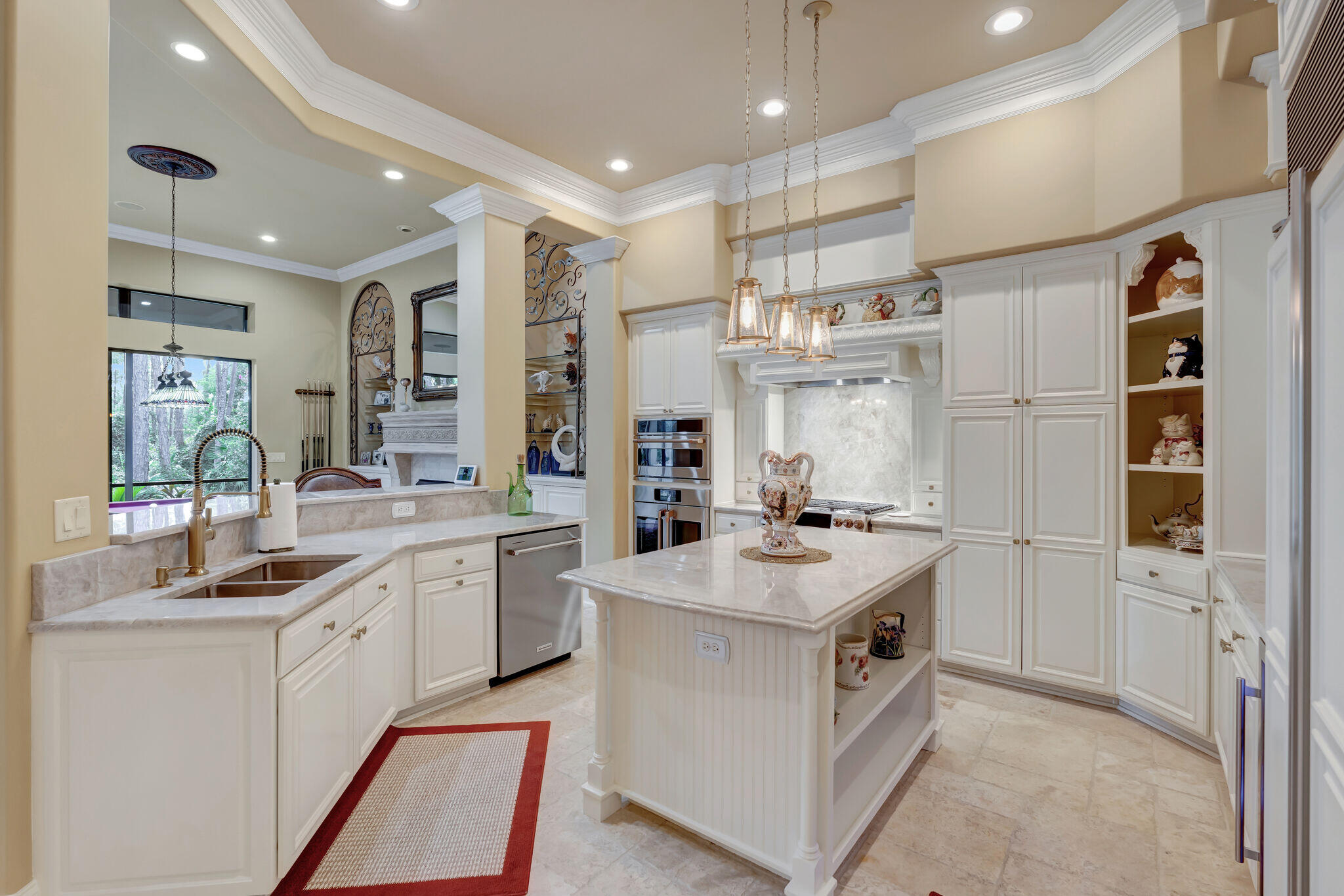 428 Captains Circle Destin, FL 32541 - Photo 15 of 88 a kitchen with a sink stove and refrigerator