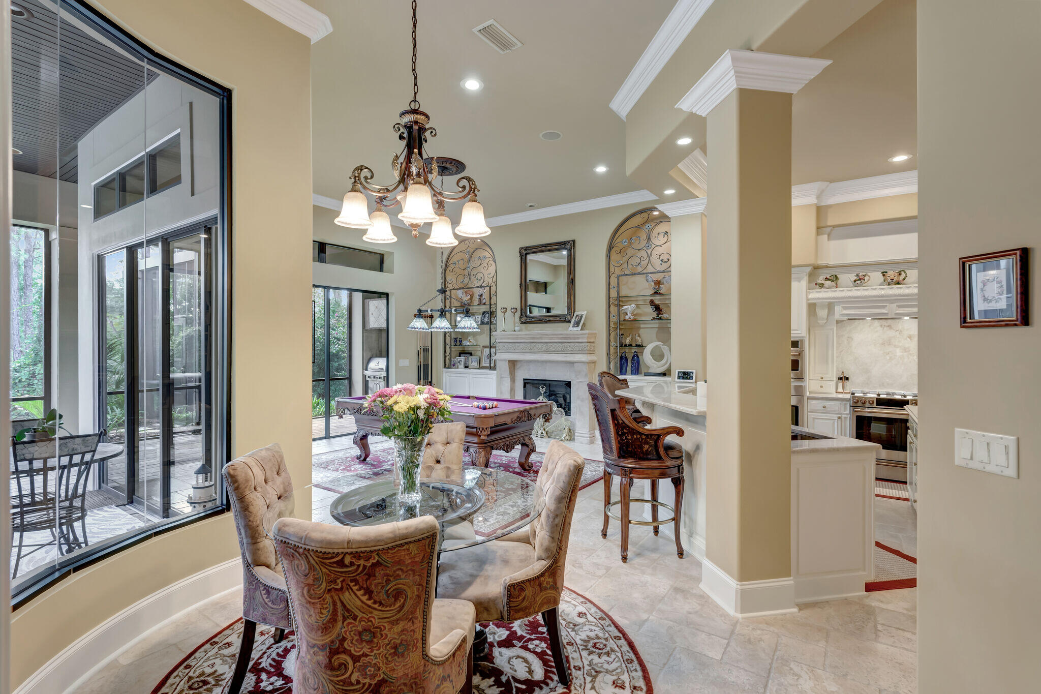 428 Captains Circle Destin, FL 32541 - Photo 17 of 88 a view of a dining room with furniture and a chandelier