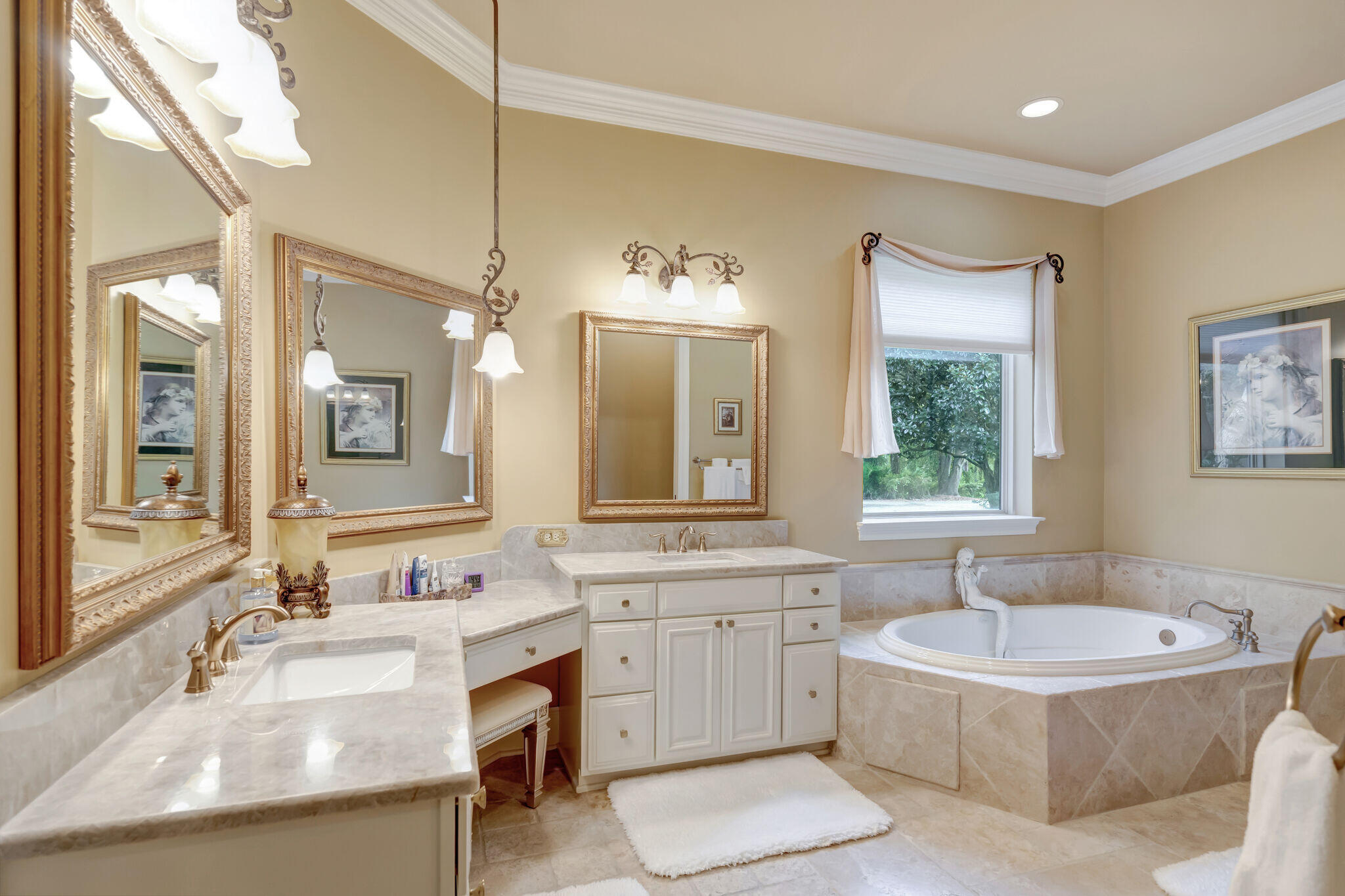 428 Captains Circle Destin, FL 32541 - Photo 26 of 88 a bathroom with a granite countertop tub sink and mirror