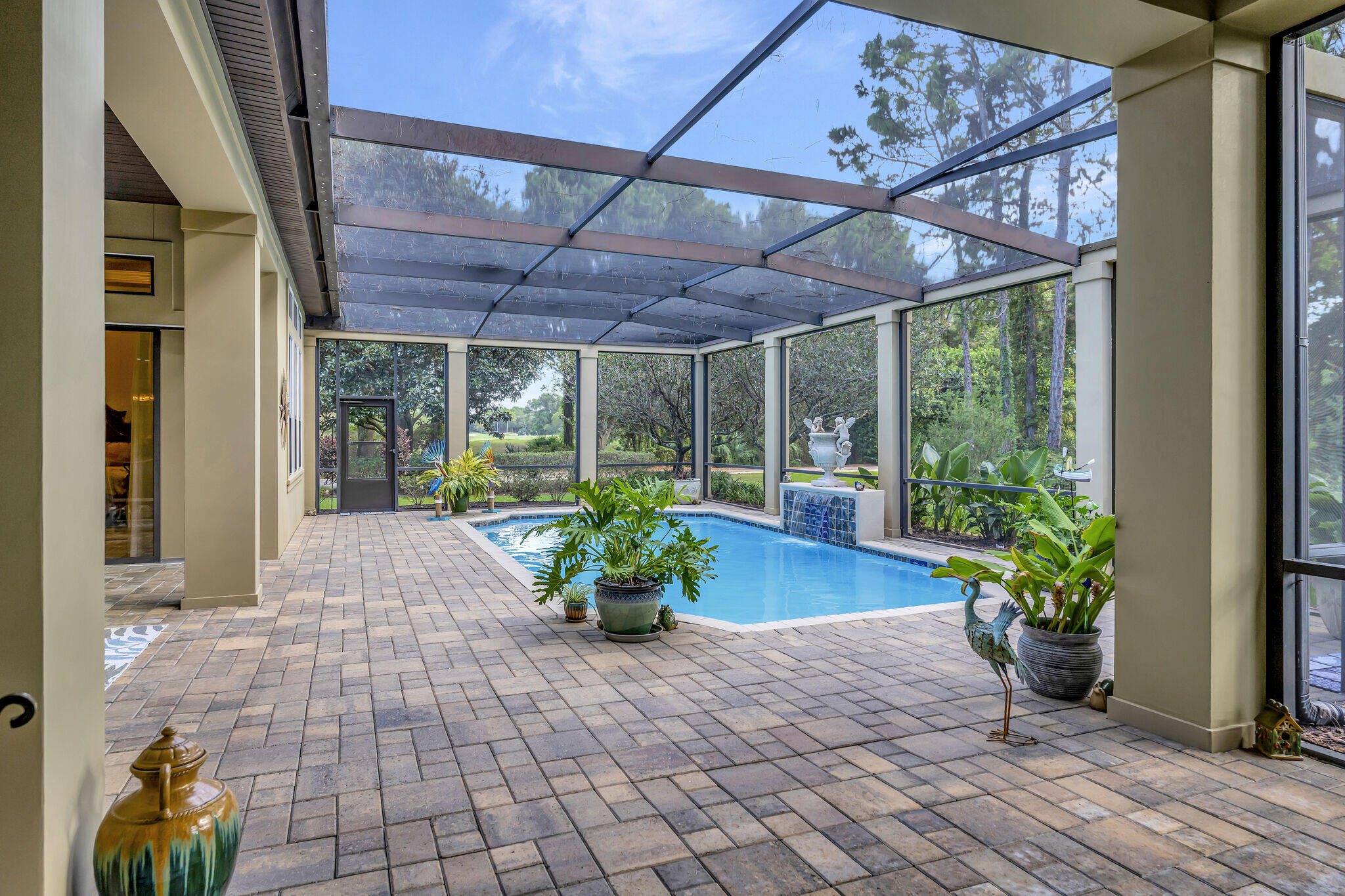 428 Captains Circle Destin, FL 32541 - Photo 35 of 88 a view of a porch with chairs and potted plants