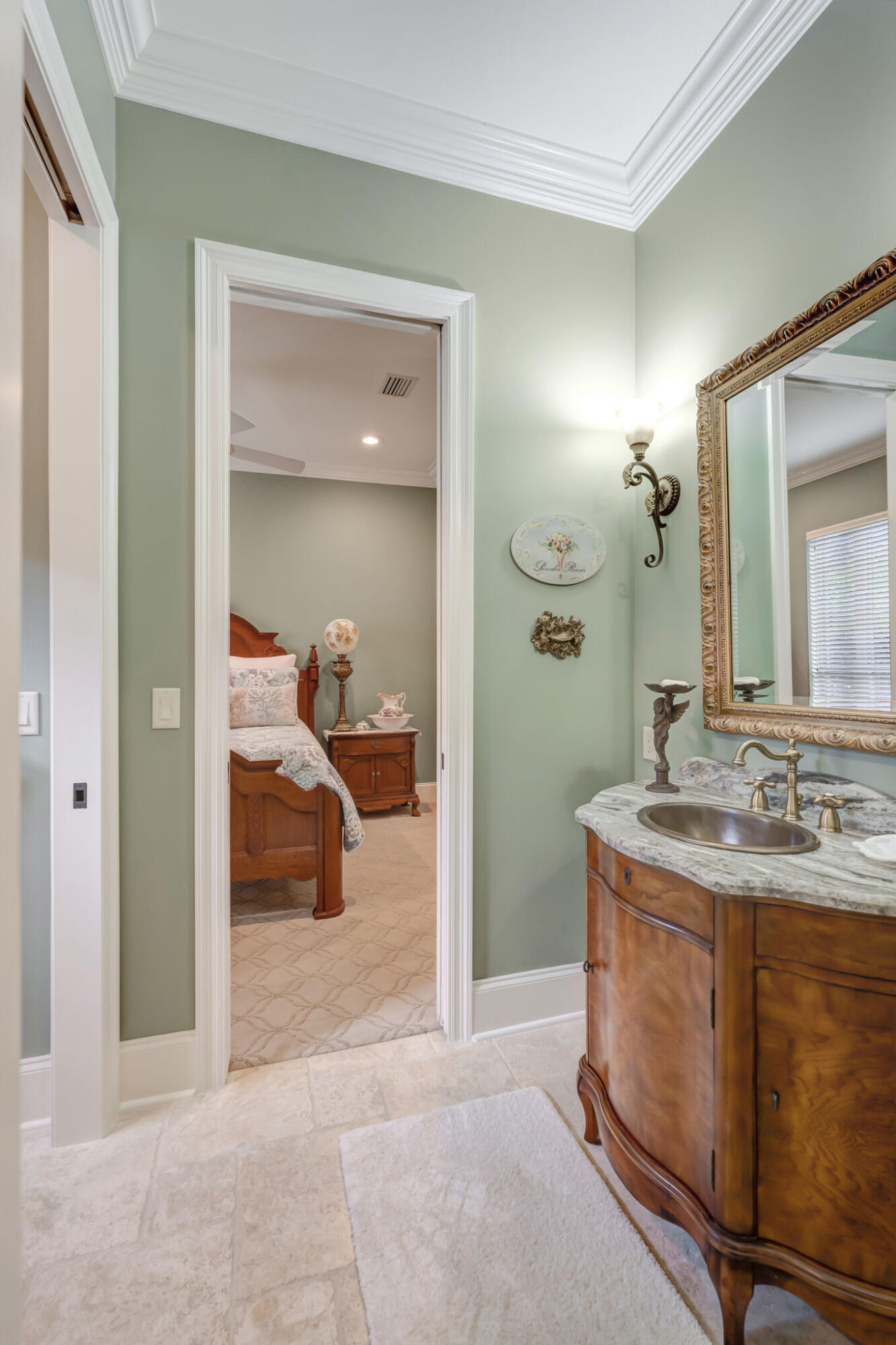 428 Captains Circle Destin, FL 32541 - Photo 46 of 88 a en suite bathroom with a sink and a mirror