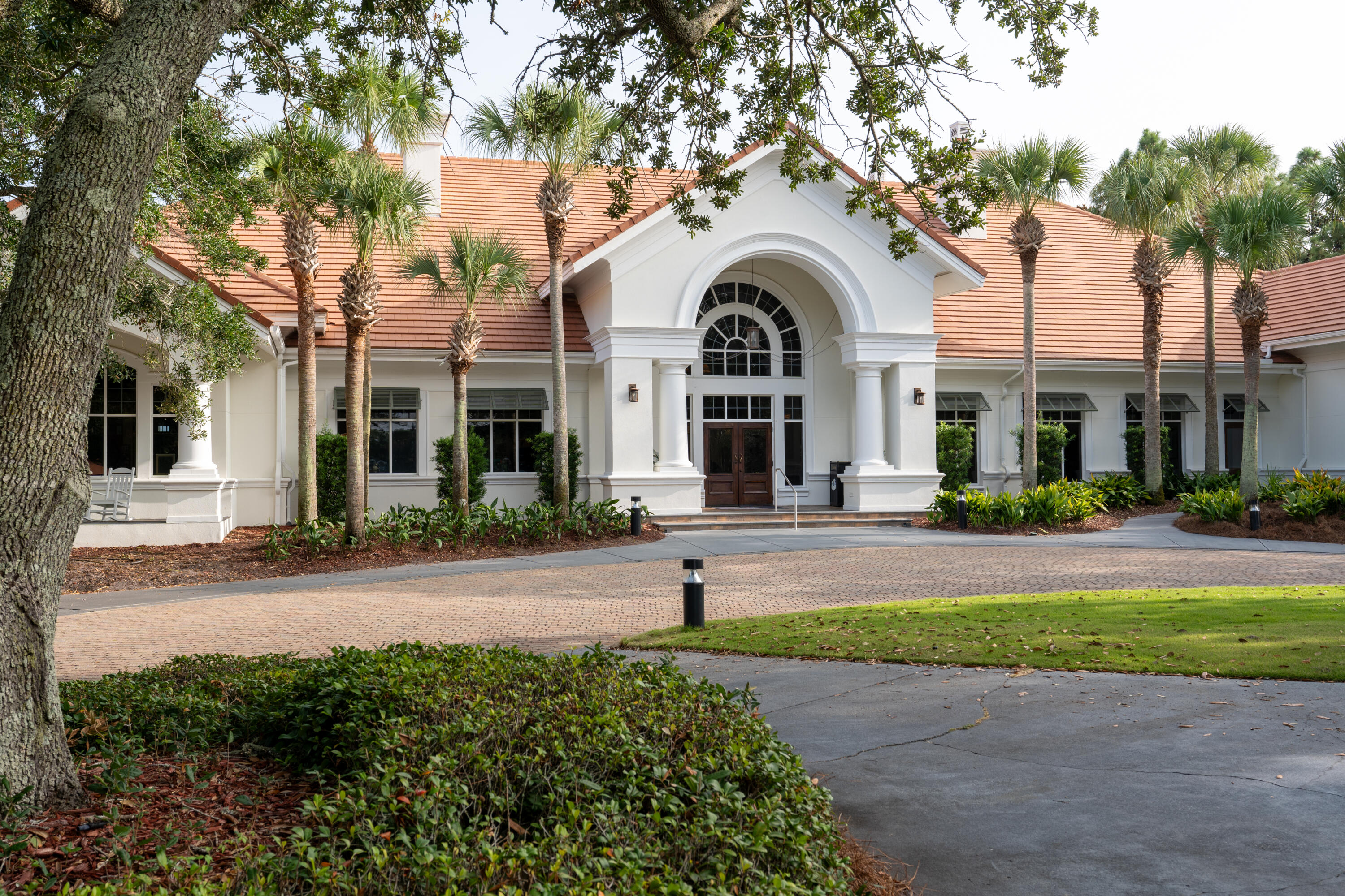 428 Captains Circle Destin, FL 32541 - Photo 64 of 88 a front view of a house with a yard