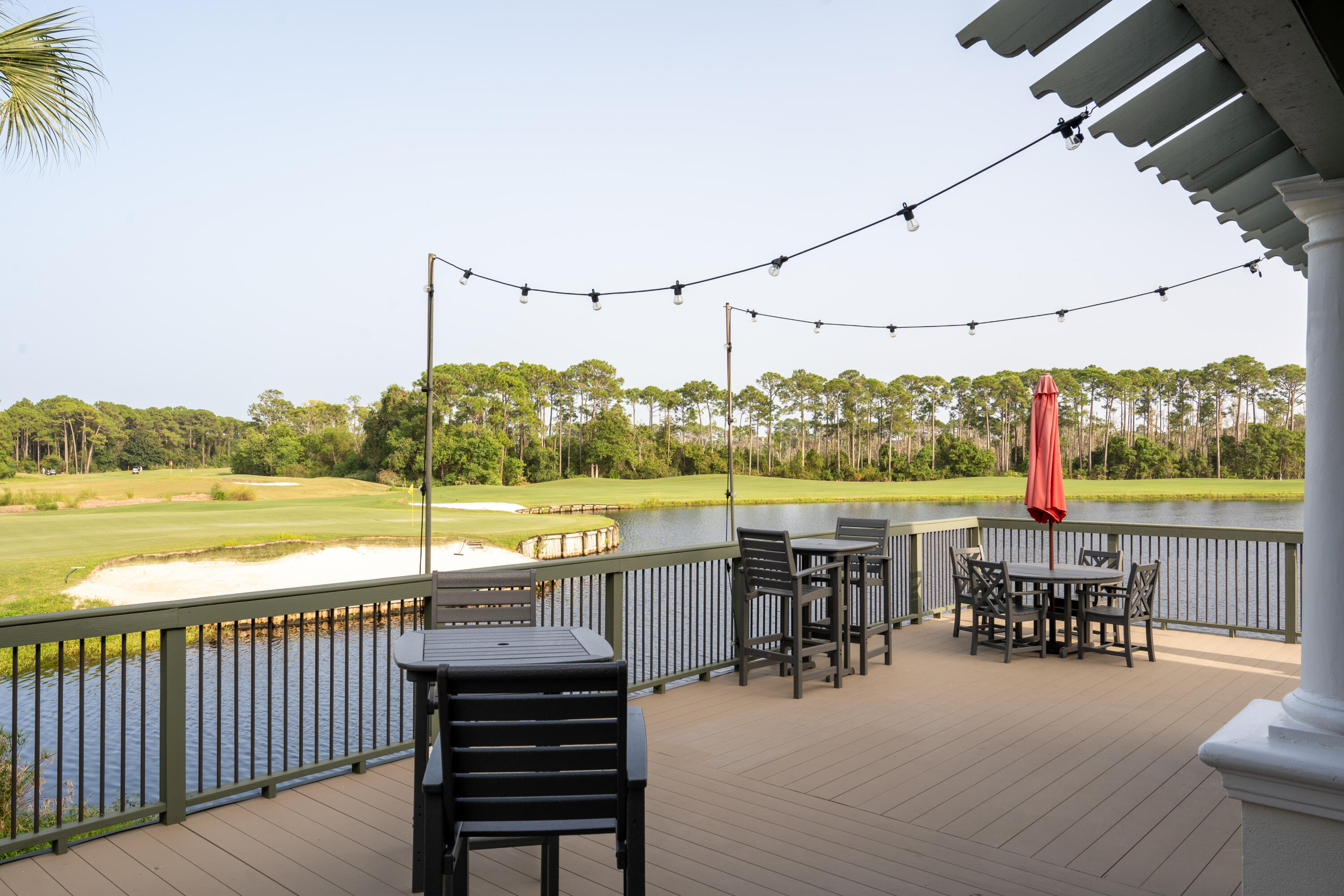 428 Captains Circle Destin, FL 32541 - Photo 65 of 88 a view of a balcony with lake view and wooden floor