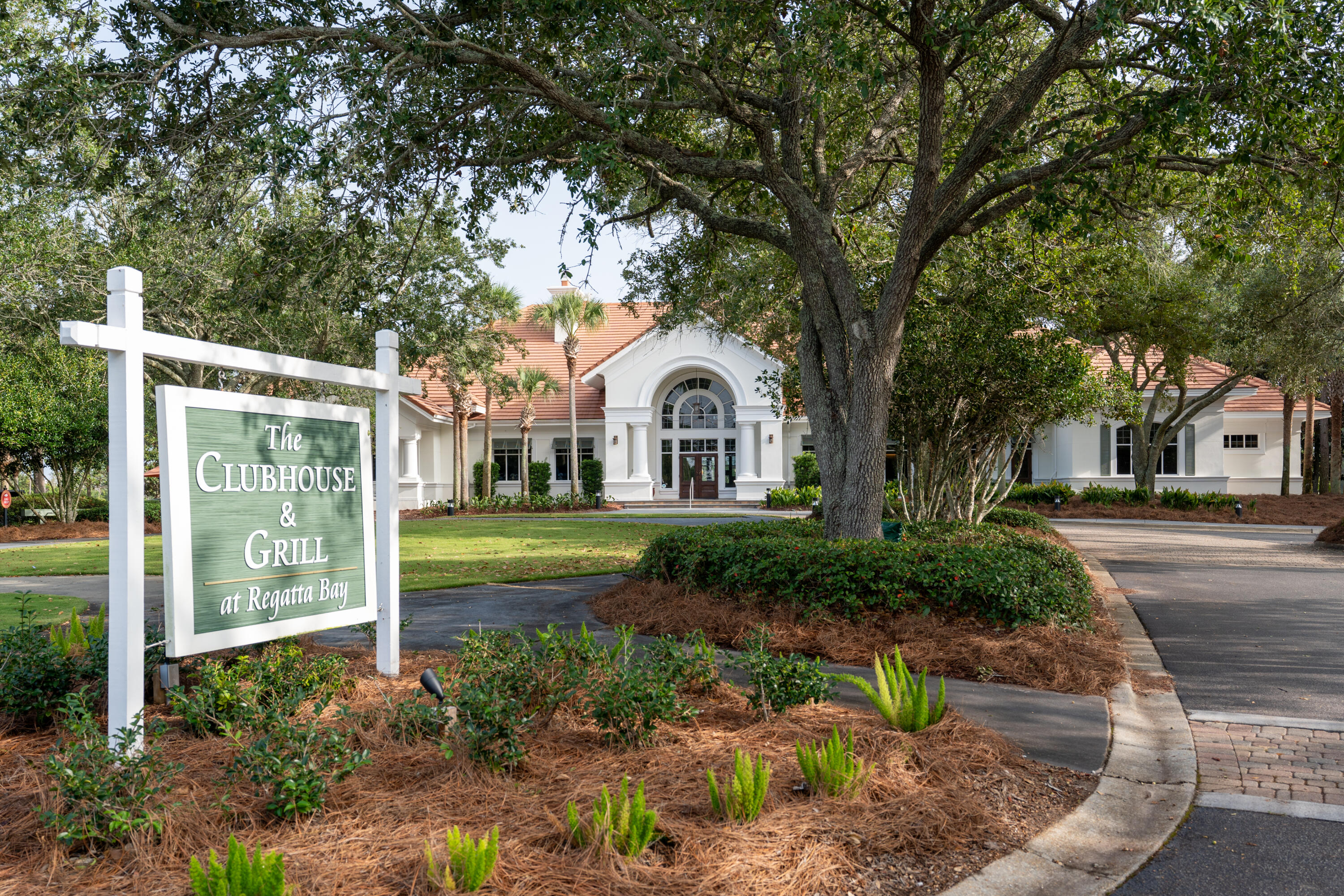 428 Captains Circle Destin, FL 32541 - Photo 75 of 88 a house view with a garden space