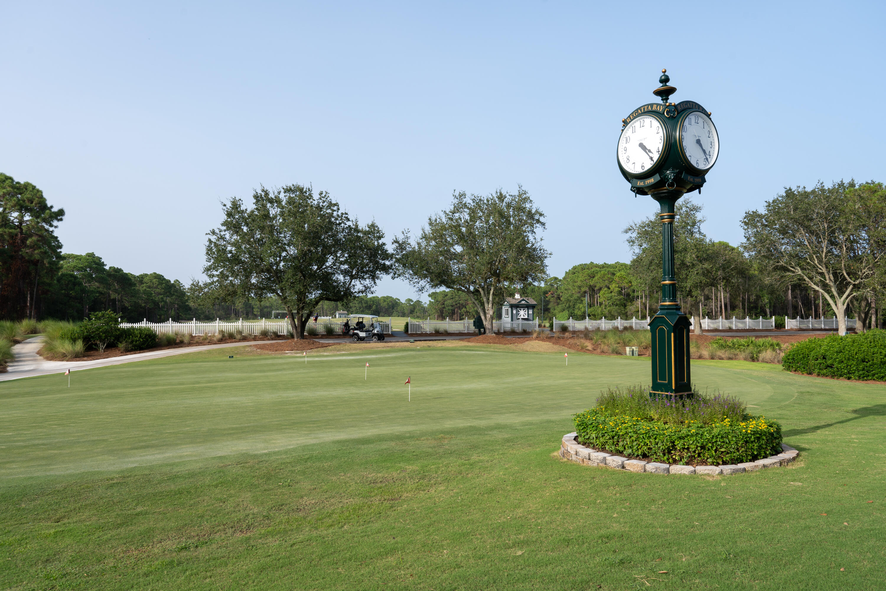 428 Captains Circle Destin, FL 32541 - Photo 77 of 88 a front view of a house with garden