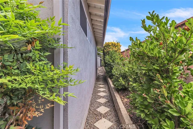 a view of a backyard of the house