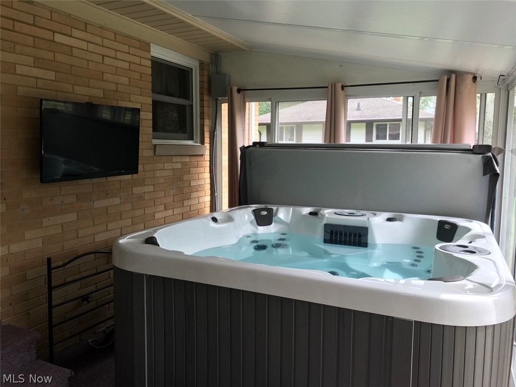 3740 Harris Road Broadview Heights, OH 44147 - Photo 20 of 22 Hot tub is located in the enclosed sunroom