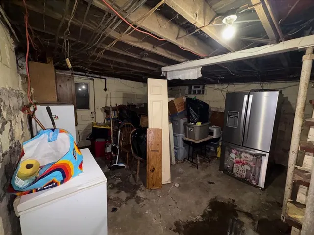 a view of a backyard with a garden and plants