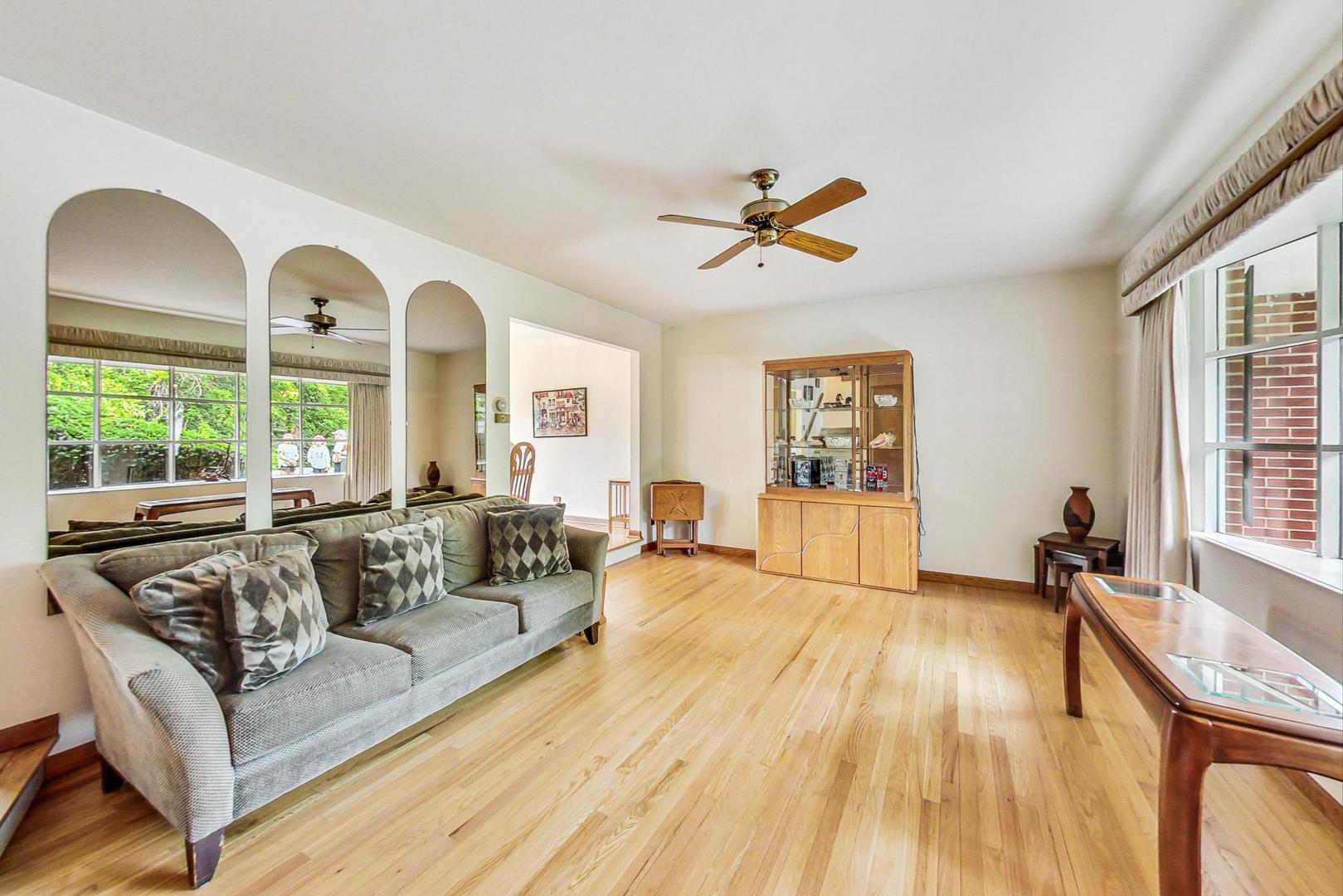 5701 Lenox Road Lisle, IL 60532 - Photo 2 of 24 a living room with furniture and a large window
