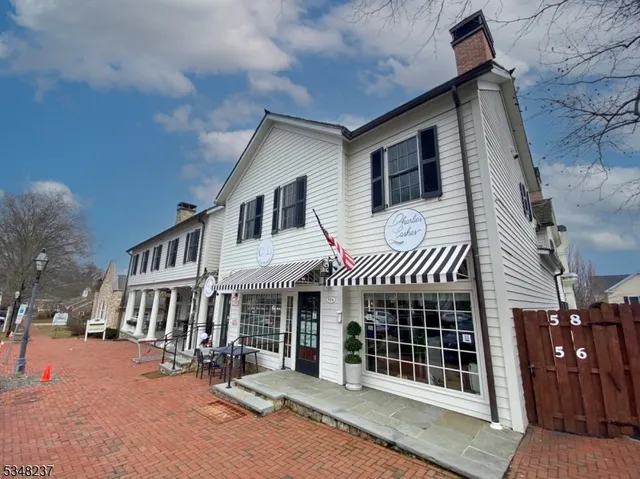 a front view of a house with a porch