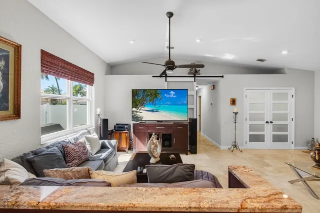 a room with furniture and a window