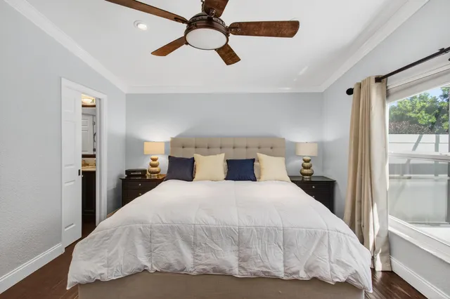 a view of a swimming pool with a yard