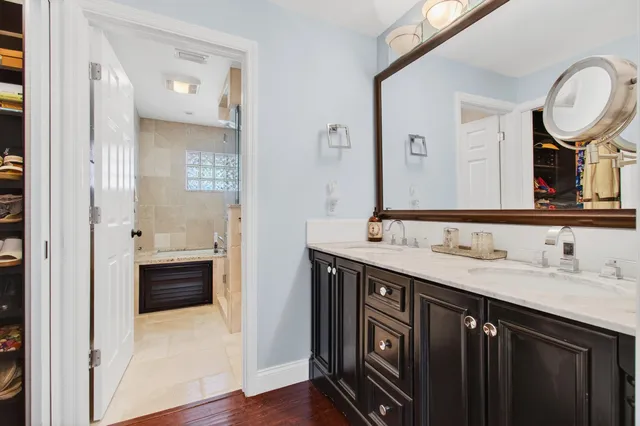 a view of a house with a backyard and a patio