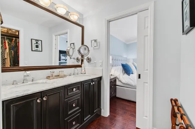 a view of a park with iron fence