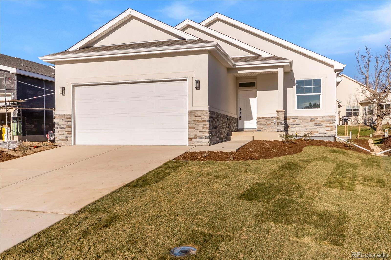 1230 Swainson Road Eaton, CO 80615 - Photo 1 of 35 a front view of a house with a yard