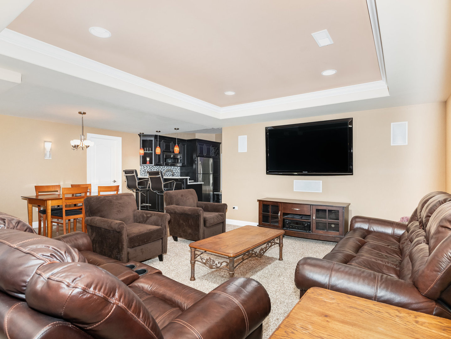 2223 Spartina Lane Naperville, IL 60564 - Photo 36 of 48 a living room with furniture and a flat screen tv