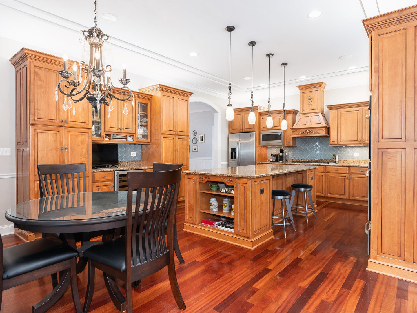 2223 Spartina Lane Naperville, IL 60564 - Photo 5 of 48 a view of a dining room with furniture window and wooden floor
