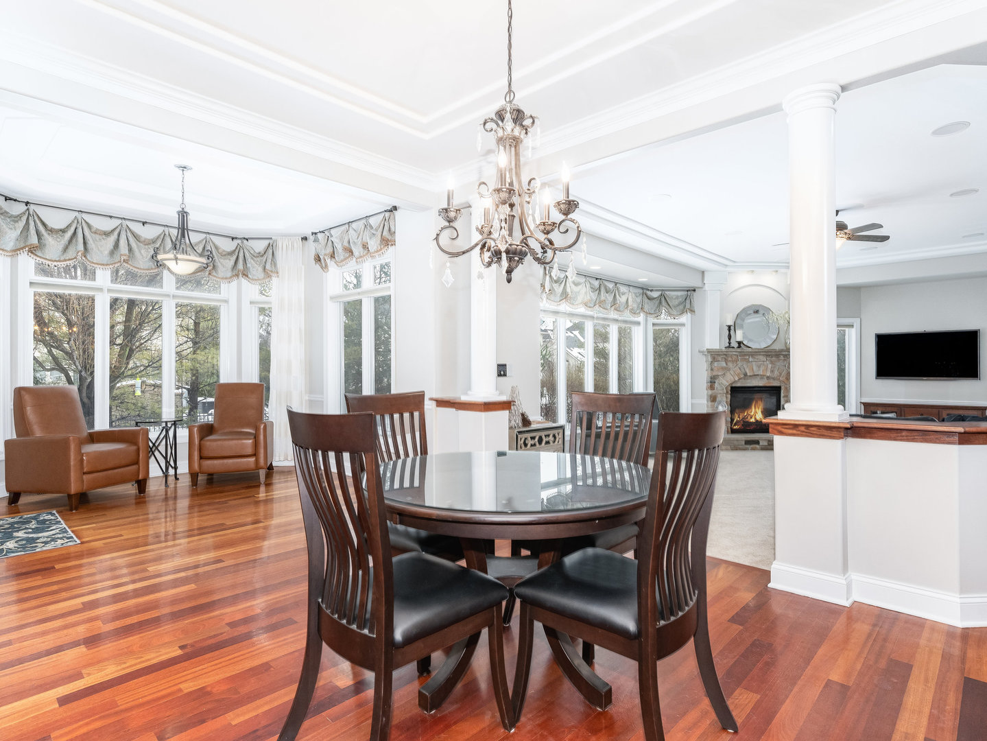 2223 Spartina Lane Naperville, IL 60564 - Photo 9 of 48 a view of a dining room with furniture window and wooden floor